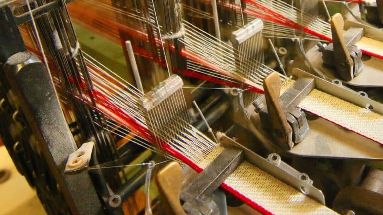 Narrow fabric being woven at the Wayne Mills plant in Philadelphia.